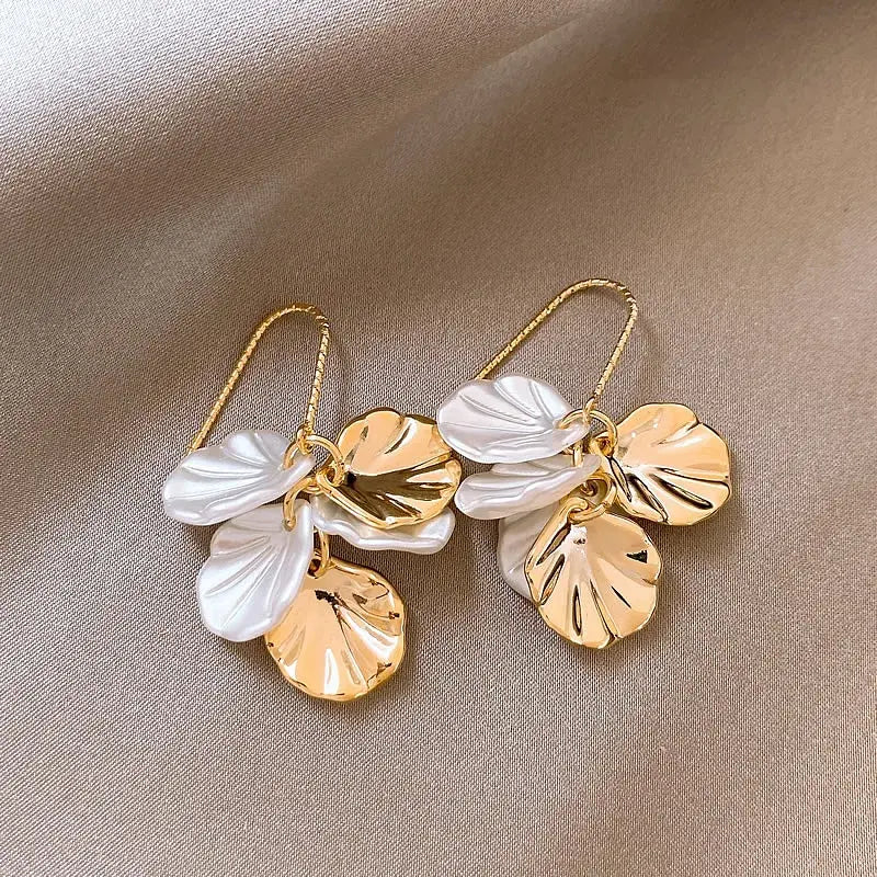 Elegant earrings made of white and golden petals Unique Joyas