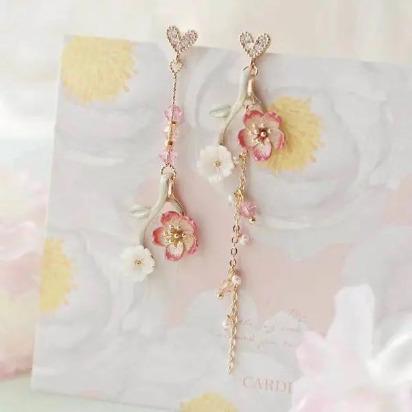 Elegant dangling earrings with floral pattern Unique Joyas