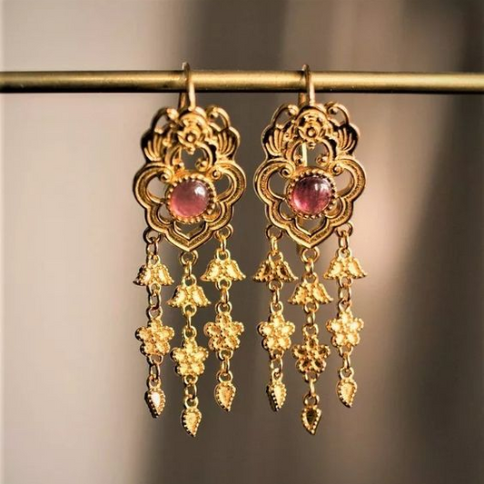 Vintage earrings with gold and red stone pendant