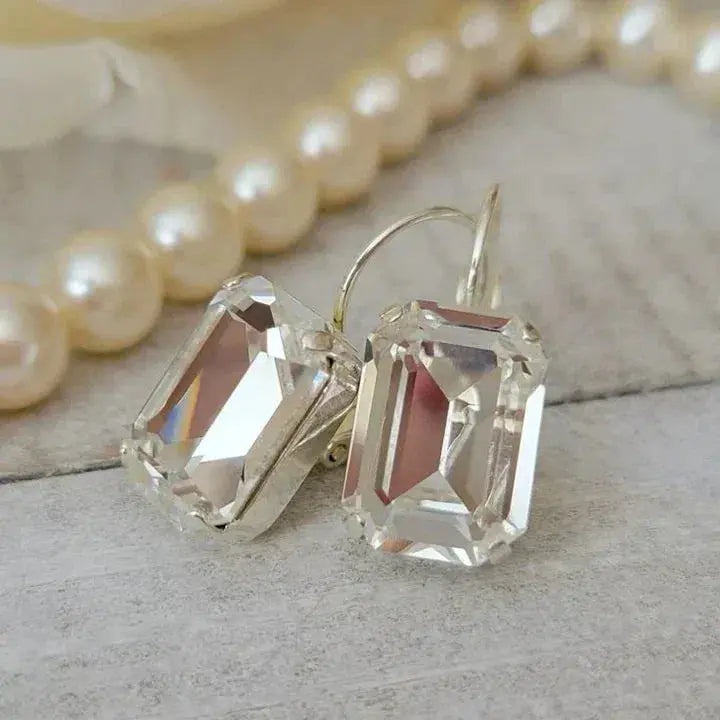 Vintage earrings made of white glass Unique Joyas