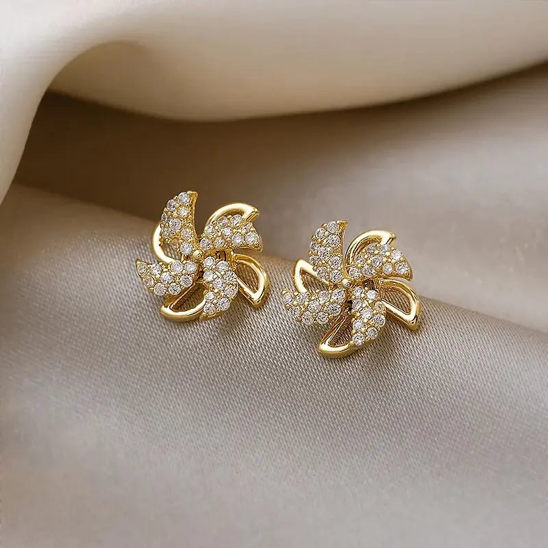 Gold Pinwheel Earrings with Zirconia Unique Joyas