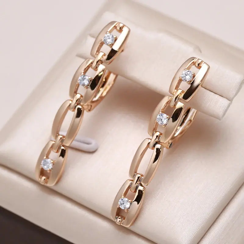 Elegant Zirconia Chain Earrings in Gold Unique Joyas