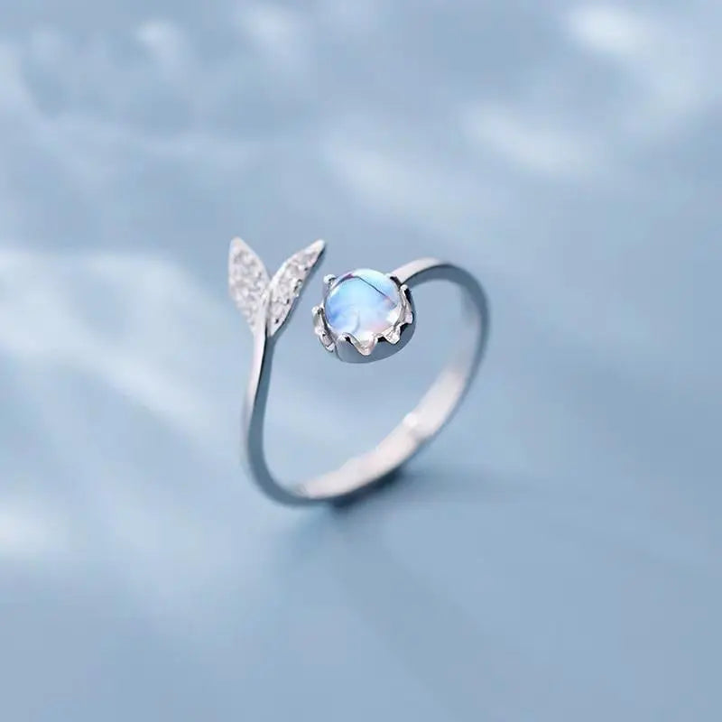 Adjustable ring with dolphin tail made of sterling silver and blue zirconium dioxide Unique Joyas